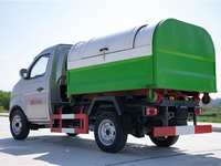 Camion à ordures élévateur à crochet compact Changan 4 CBM bras hydraulique système de décollage collecteur d'ordures automatique 4x2 manuel Euro 4 émissions