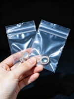 Pochette d'emballage transparente en plastique pour bijoux avec fermeture à bouton, estampage à chaud pour lunettes et bijoux, sac auto-scellant