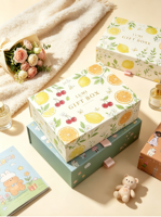 Boîte cadeau rigide écologique et recyclable avec illustration de plantes fraîches, ruban et poignée à tirer, emballage cadeau d'anniversaire coloré