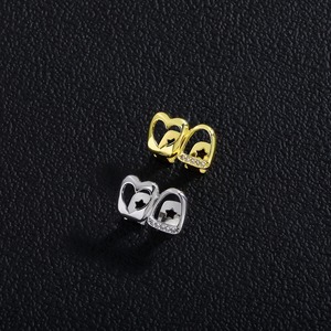 Vrouwen K9 Tanden Goud Open Gezicht Hartvormig Raam Grillz 18K Verguld Messing Metalen Zirkonia Diamanten 2 Tanden Grillz - Product Image 1
