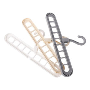 Estante de Almacenamiento Multifuncional de Plástico con Nueve Orificios, Percha Mágica Plegable para Ropa - Product Image 4