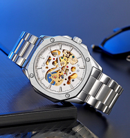 Montre mécanique automatique squelette de qualité supérieure personnalisable, engrenages apparents en acier bleu et autres finitions, fabrication professionnelle OEM ODM