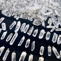 Points de cristal de quartz clair brut foré en gros pour pendentif