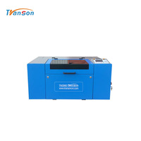 Máquina de Grabado Láser CNC de Sobremesa TRANSON para Cuero, Acrílico, Madera, Goma y Más - Refrigerada por Agua de Alta Calidad de Shandong