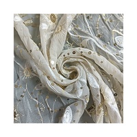 Tissu en mousseline de soie à sequins brodés en polyester de haute qualité100 % décoratif et beau pour le vêtement de ZhongZhe