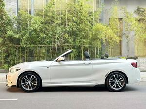 BMW Serie 2 Convertible de Segunda Mano con Excelente Rendimiento, Caja de Cambios Automática, Tracción en las Cuatro Ruedas, R15, Volante a la Izquierda, Interior Oscuro de Cuero - Product Image 2