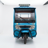 Tricycle électrique semi-fermé pour le transport de marchandises et de passagers, idéal pour les livraisons en ville