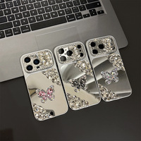 Coque de téléphone de luxe pour iPhone 17 Pro Max avec strass papillon en TPU+PC, design miroir personnalisé pour femme, protection de l'appareil photo, compatible iPhone 16