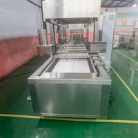 Friteuse industrielle à grande capacité avec filtration automatique de l'huile pour les usines alimentaires de Kuyrdak, de Kazakh Pelmeni et de pâtisseries mixtes