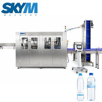 Machine de remplissage automatique monobloc pour bouteilles PET d'eau minérale potable de 200 à 1000 ml en gros