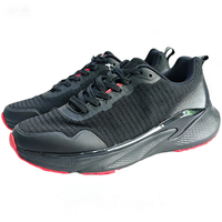 Sneakers de sport en mesh noir avec accents rouges, unisexes, respirantes, légères, semelle antidérapante