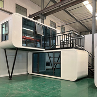 Maison-conteneur à structure en acier à double étage ODM OEM Unités modulaires mobiles Cabine Apple avec escalier pour villa et appartement