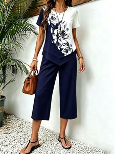 Conjunto de 2 piezas con estampado floral de nueva moda para mujer, top de manga corta con dobladillo asimétrico + pantalones cortos, conjunto informal de verano - Product Image 4