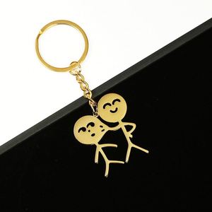 Divertido y parodista colgante para bolso de personaje de dibujos animados, llavero de acero inoxidable al por mayor con diseño de pareja de caras que se pellizcan y mecha de cerillas - Product Image 5