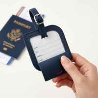 Étiquette de bagage en cuir PU en gros pour valise, étiquette d'identification de bagage de voyage avec boucle métallique, logo personnalisé OEM