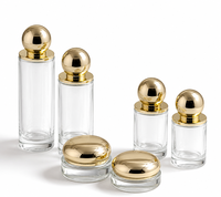 Ensemble d'emballages cosmétiques dorés avec pots en verre à couvercle rond pour crème cosmétique de 30g, 50g, 100g et flacons de 120ml, 150ml