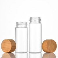 Vente en gros de mini pots en verre de marque TS avec couvercles en bambou pour stockage scellé, logo/design graphique personnalisable, fabriqués au Shandong pour noix, graines et aliments