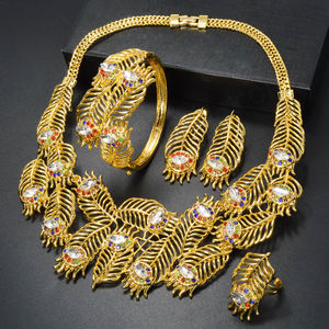 Ensemble de bijoux bohèmes de luxe plaqué or 14 carats avec zircon, comprenant boucles d'oreilles, bague, collier et bracelet - Product Image 1