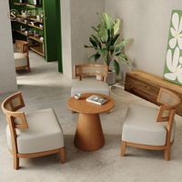 Ensemble de chaises et de tables en rotin design moderne ensemble de chaises de salle à manger en rotin rond en bois massif de luxe pour intérieur