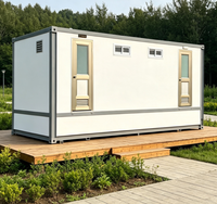 Toilettes préfabriquées en conteneur, mur texturé en brique, équipement sanitaire complet, chasse d'eau, compostage à sec, porte d'intimité pour zones panoramiques