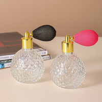 Flacon de parfum en verre MK de 50 ml et 100 ml avec bouchon à vis noir, capuchon doré, origine Jiangsu, pulvérisateur à pompe sérigraphié, emballage carton