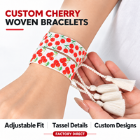 Bracelet tressé personnalisé avec pompon et motif cerise rouge, style moderne et simple, pour la personnalisation de la mode