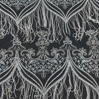 Tissu en dentelle de haute couture lourdement perlé avec franges en boucle motif feuille d'argent sur tulle ivoire pour robe de mariée et robe de soirée
