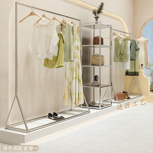 Moderno Exhibidor de Ropa Metálico Dorado, Soporte de Pared para Colgar Ropa, Estantes de Exhibición para Tiendas de Ropa - Product Image 3