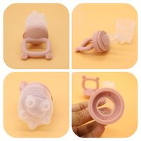 Vente en gros de tétine de qualité alimentaire pour bébé tétine en silicone pour fruits sucette mangeoire pour bébé