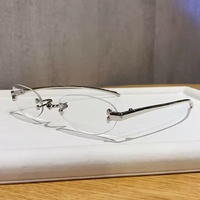 Lunettes de soleil ovales en métal sans monture, nouvelle collection 2026, style tendance européen et américain, même style que les influenceurs Instagram.