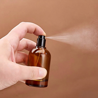 Flacon pulvérisateur rond en verre brun ambré avec pulvérisateur noir, conteneur de parfum vide, plusieurs tailles, vente en gros