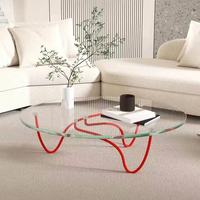 Table basse moderne pour salon avec base en métal rouge et plateau en verre
