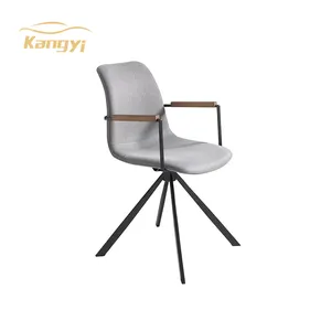 كرسي دوار ذهبي الشكل مميز كرسي دوار منجد في القماش مع أرجل فولاذية سوداء