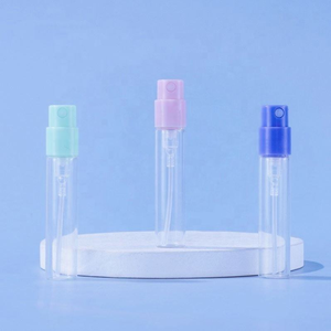 Portable Mini Clear Cylinder Spray Bottles 2ml Empty Vials with Pink Green Blue Caps for Personal Care - Product Image 1