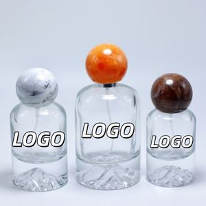 Luxury 50ml Round Glass Perfume Bottle with Resin <b>Cap</b> Hot Stamping <b>Mountain</b> Bottom Unique Perfume Bottle - Product Image 1