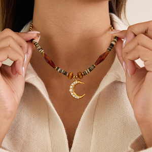 <span class=keywords><strong>Collana</strong></span> Artigianale JD <span class=keywords><strong>con</strong></span> Pendente Celeste Placcato Oro, Occhio di Tigre, <span class=keywords><strong>Sole</strong></span> <span class=keywords><strong>e</strong></span> <span class=keywords><strong>Luna</strong></span>, <span class=keywords><strong>con</strong></span> Accenti in Legno <span class=keywords><strong>e</strong></span> Resina, Gioielli Naturali Boho - Product Image 1