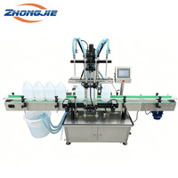 Zhongjie Remplisseuse entièrement automatique 42L à quatre têtes avec pompe à engrenages à servo-moteur pour spiritueux, sauces, vinaigre, lait, huiles alimentaires, eau, en métal/verre