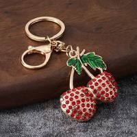 Nouveau porte-clés créatif en forme de cerise, mousqueton en émail et strass, breloque de sac en métal, élégant pendentif pour clés de voiture, vente en gros directe usine