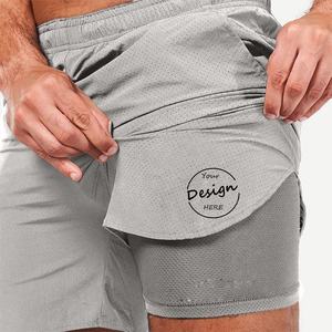 Pantalones cortos de gimnasio 2 en 1 ecológicos personalizados para hombres, pantalones cortos de malla de poliéster ajustados de secado rápido de alta calidad con bolsillos y cintura elástica - Product Image 5