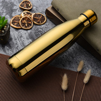 Bouteilles d'eau isolées sous vide en acier inoxydable de 17oz de couleur personnalisée Bouteille de fiole thermique en métal en forme de cola en cuivre et or