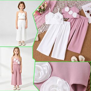 Nuovo Set Estivo per Ragazze: Canotta Floreale Senza Maniche Stile Europeo e Americano Disponibile - Product Image 1