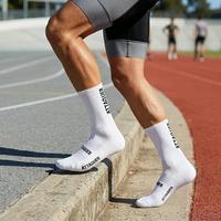 Chaussettes de sport en coton peigné avec logo personnalisé du fabricant OEM, chaussettes de basket-ball avec coussinets en tissu éponge respirant pour l'entraînement