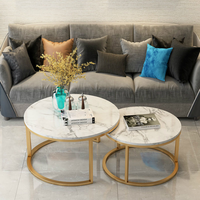 Table basse d'appoint moderne en pierre ronde avec structure métallique et rangement pour chambre et salon