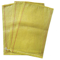 Sacs en maille vides tissés circulaires de la couleur rouge 10 kg de petite taille pour emballer des pommes de terre d'oignons avec le cordon