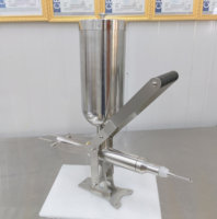 Machine manuelle d'injection de crème pour croissants, gâteaux et choux à la crème