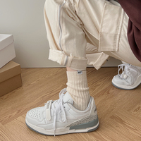 Chaussures de course sportives respirantes antidérapantes à plateforme à coussin d'air à lacets