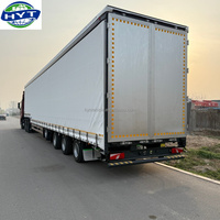 Promotion : Semi-remorque porte-conteneurs 4 essieux 40 pieds avec compartiment de chargement fermé pour un transport efficace