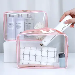 Bolsa de maquillaje transparente impermeable con logotipo personalizado, neceser de viaje de Pvc transparente con cremallera