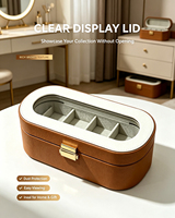 Boîte à montre ovale de luxe en cuir avec fenêtre transparente, quincaillerie métallique dorée, doublure en velours, fermeture à verrou, étui de voyage portable pour montre