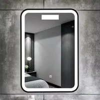 Espejo inteligente LED con marco de madera con estilo moderno con desempañador e iluminación táctil para uso en hoteles Espejo de baño montado en la pared
